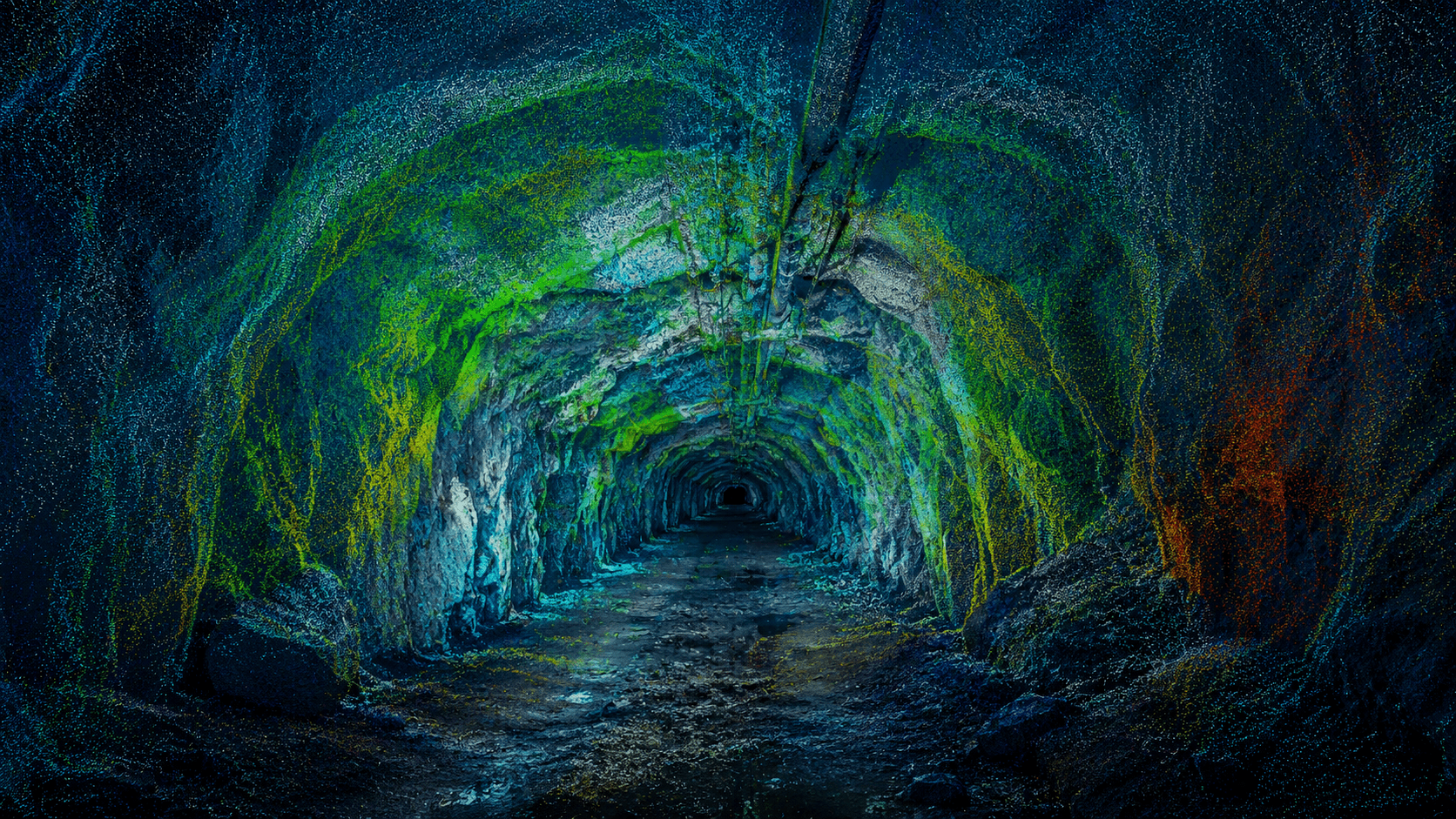 Underground mine drive with rock support and ventilation ducting.